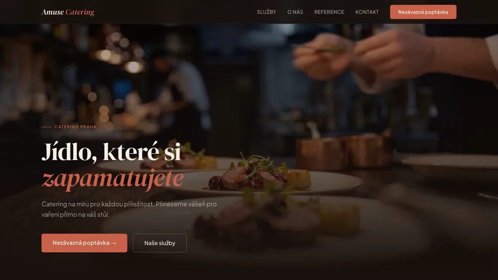 Úvodní obrazovka webu cateringu Amuse s nadpisem Jídlo, které si zapamatujete